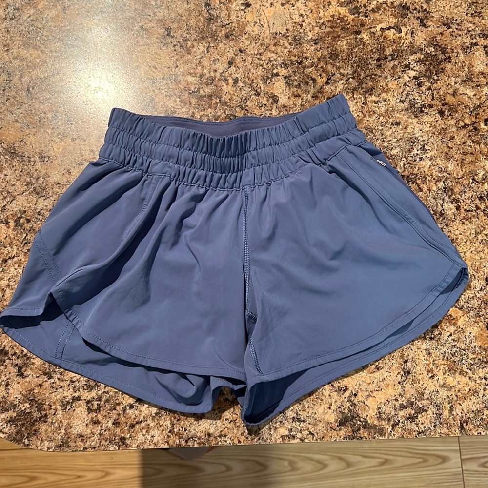 Lululemon, Size 4  “track that” 3 inch lined shorts.